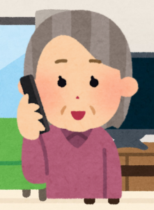 ガラホで電話する高齢者